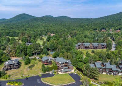 HillsideCondoWithWhitefaceMountainViews A Exterior Back GolfCourse